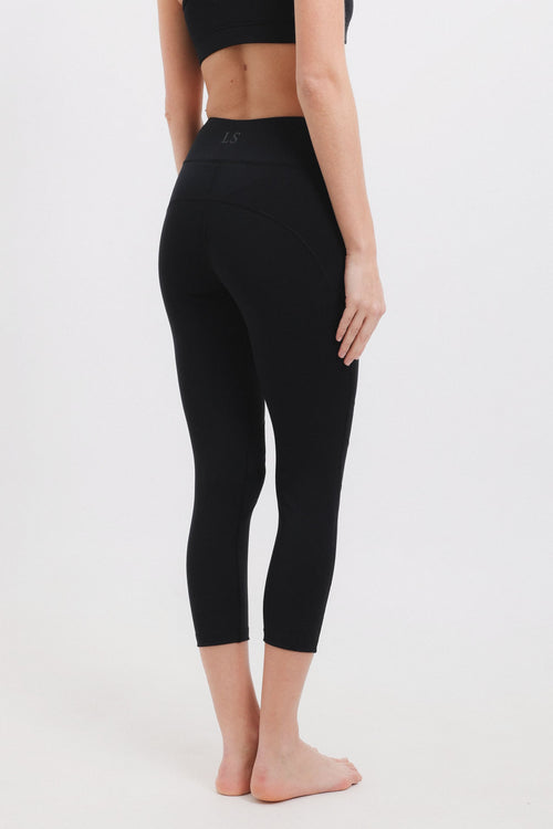 Czarne legginsy do jogi