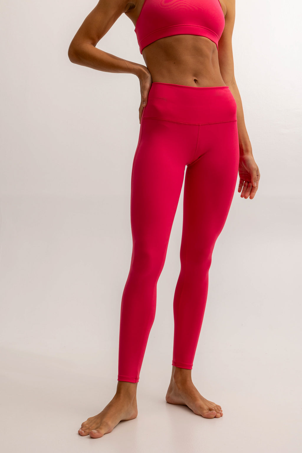 Różowe legginsy sportowe dla kobiet